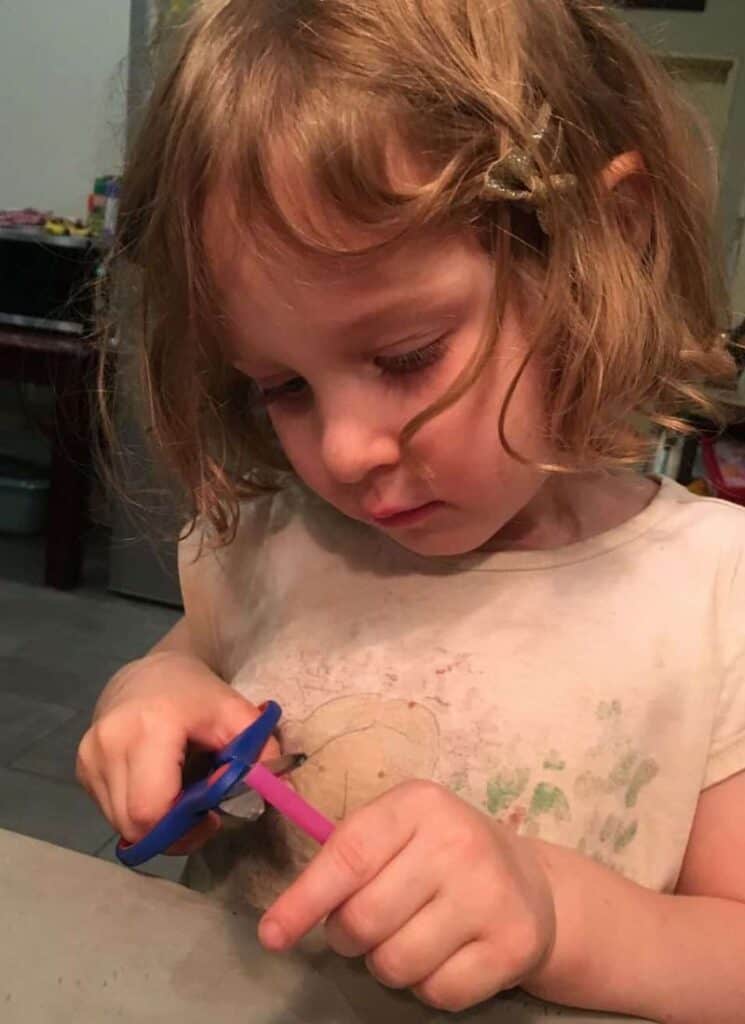 snipping of straws into pieces